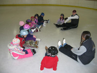 SQSA Learn to Skate Ad pic - sitting in a circle
